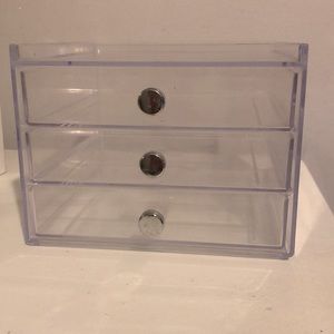 Acrylic makeup drawers.